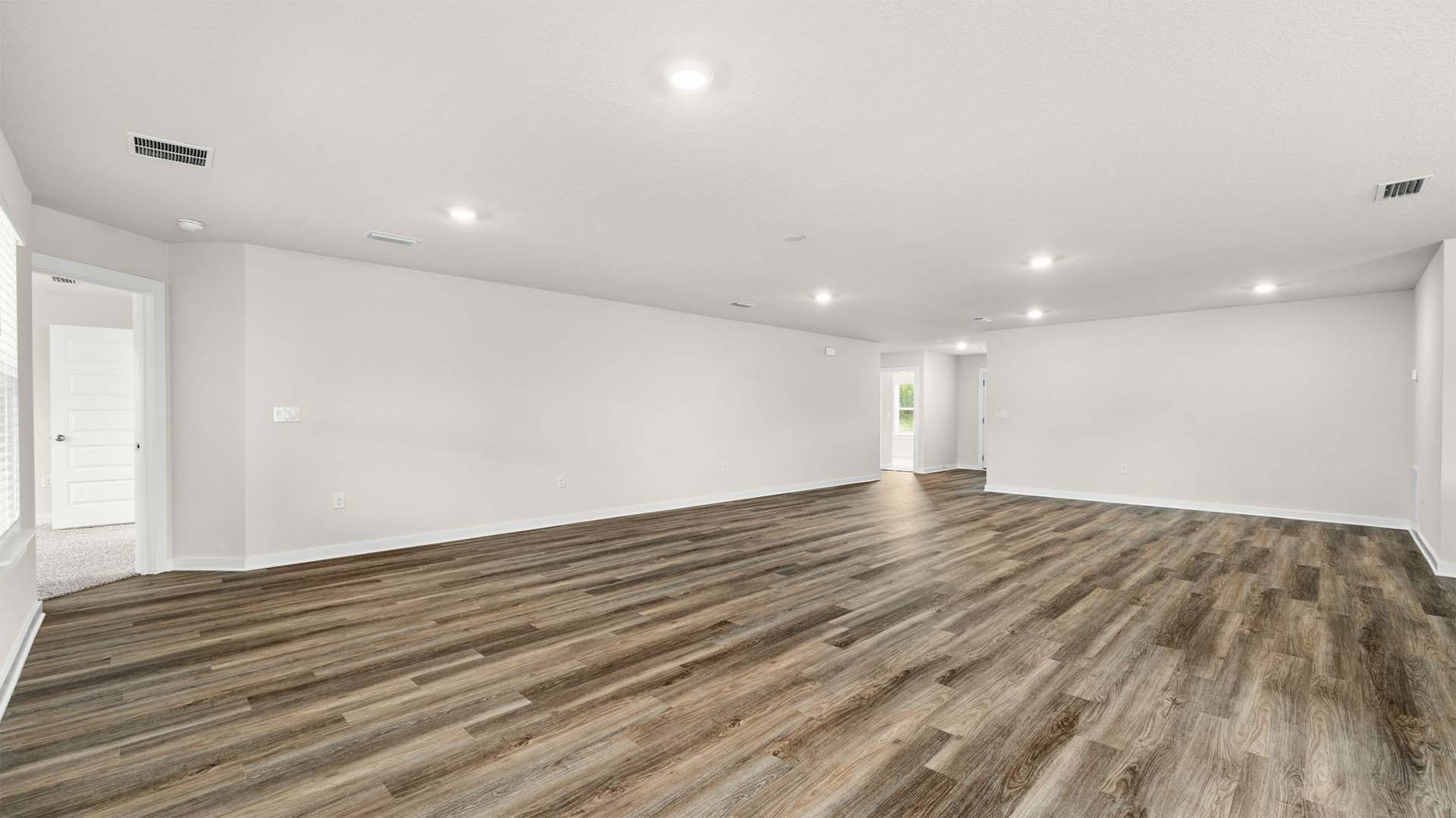 View of the open concept from the back patio access off the living area
