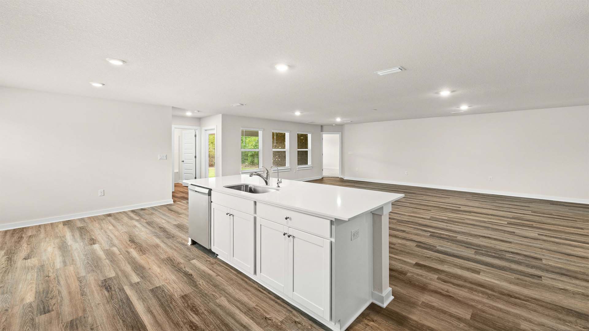 The kitchen is open to the living room