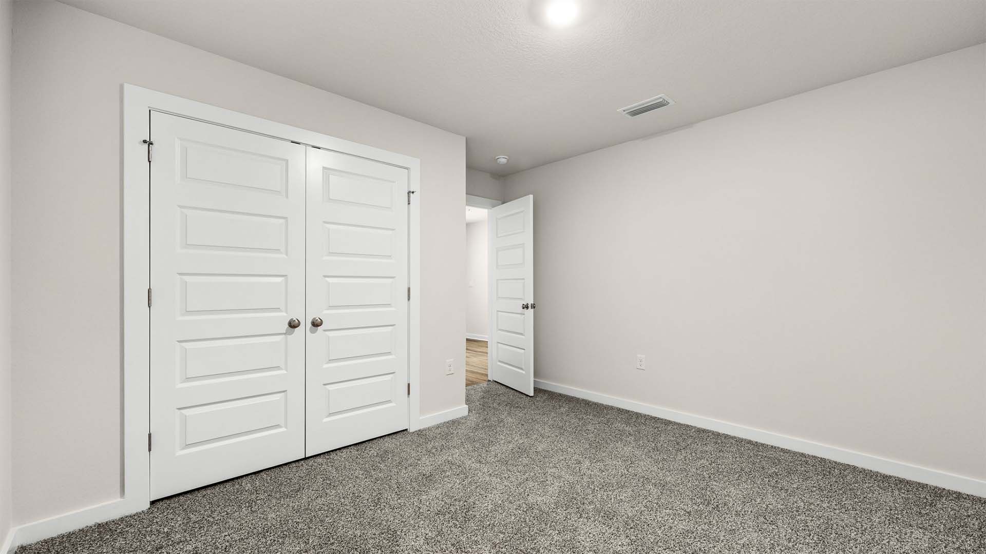 Each guest bedroom has carpet