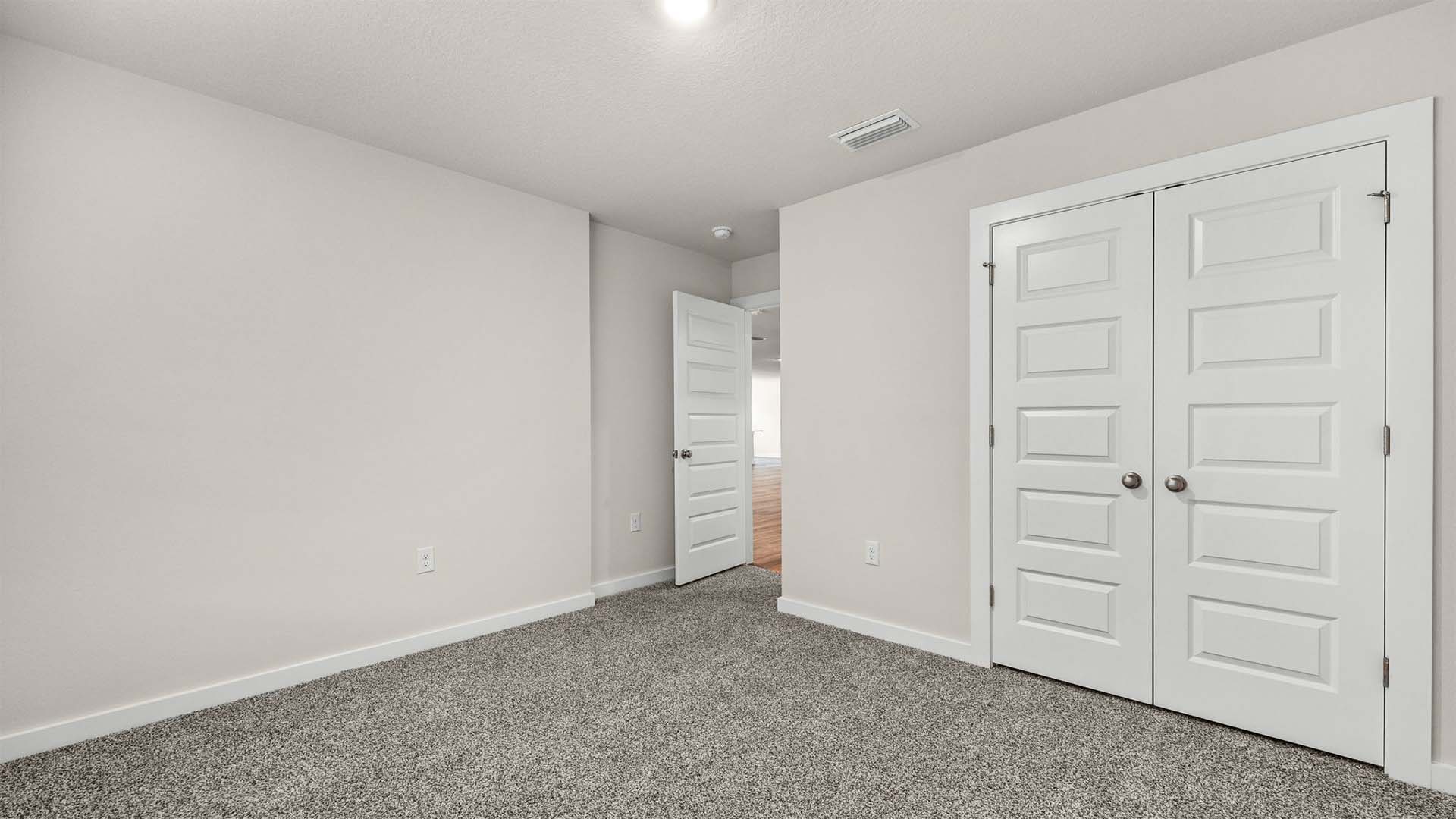 The guest bedrooms have ample closet space