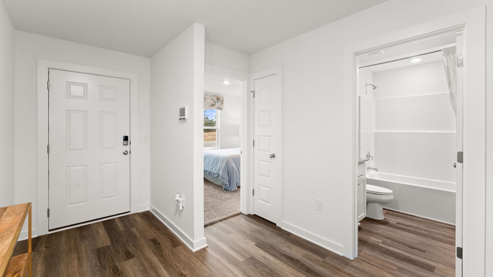 This image shows the hall holding the two guest bedrooms and shared bath between