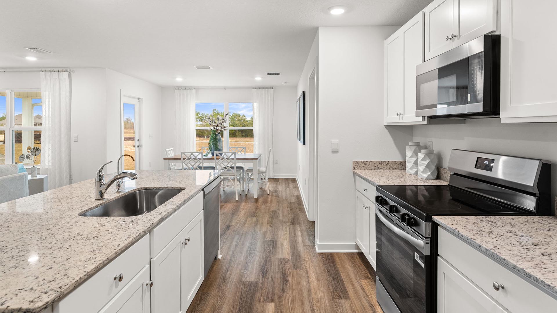 There is a dining area adjacent to the kitchen