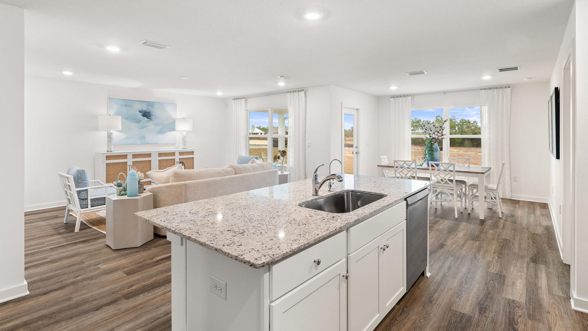 The kitchen is open to the living and dining areas