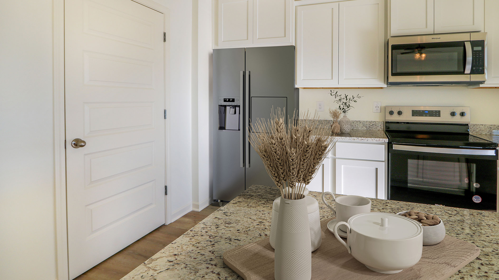 The Aria has an open kitchen with corner pantry