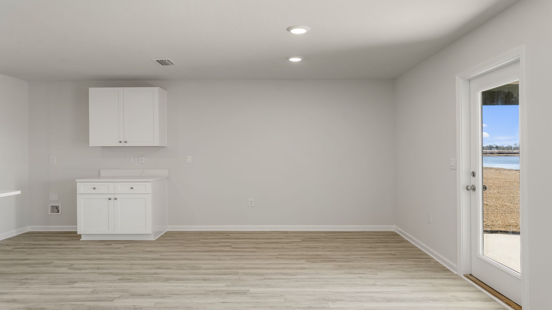 There is a dining area adjacent to the kitchen