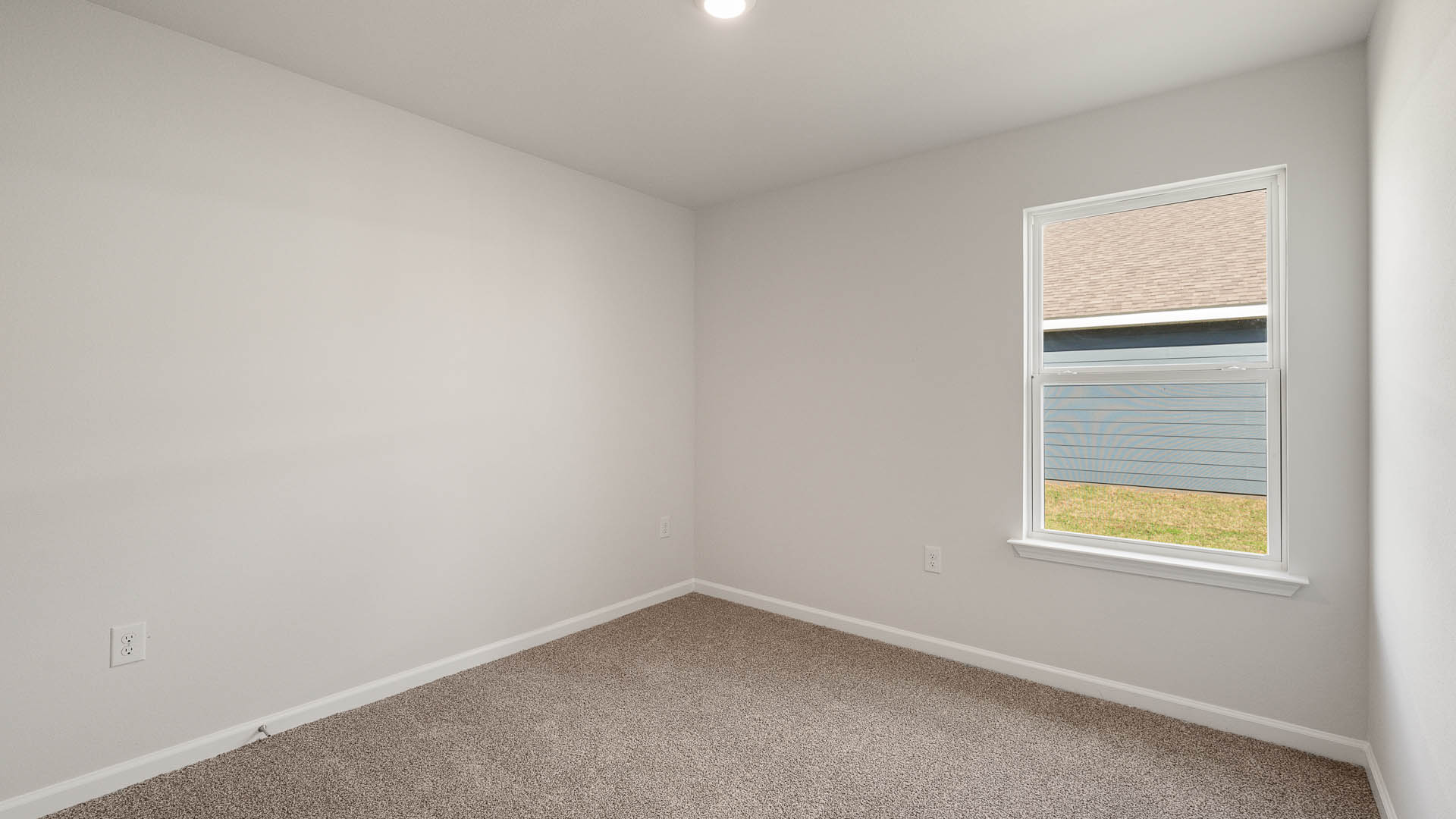 Two additional bedrooms are located off the living area