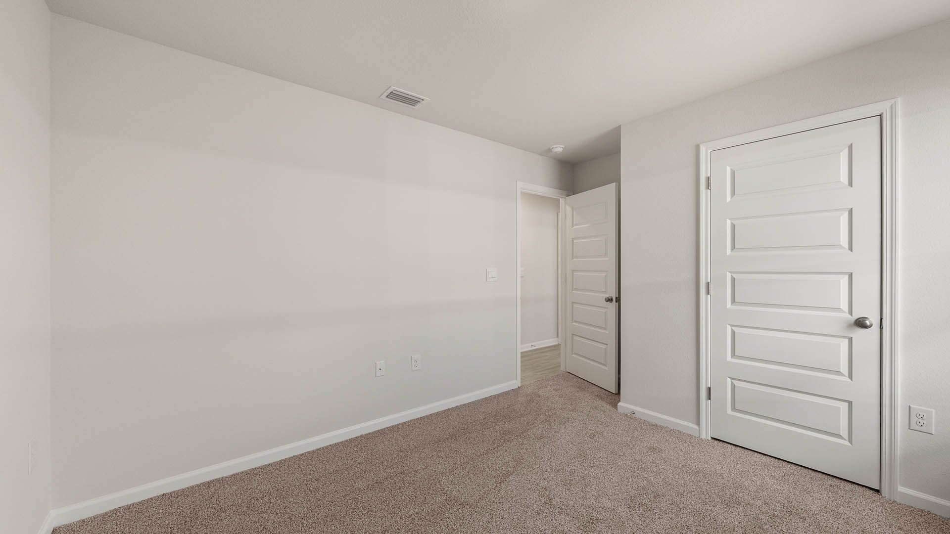 There is a linen closet in the small hall where bedrooms two and three reside