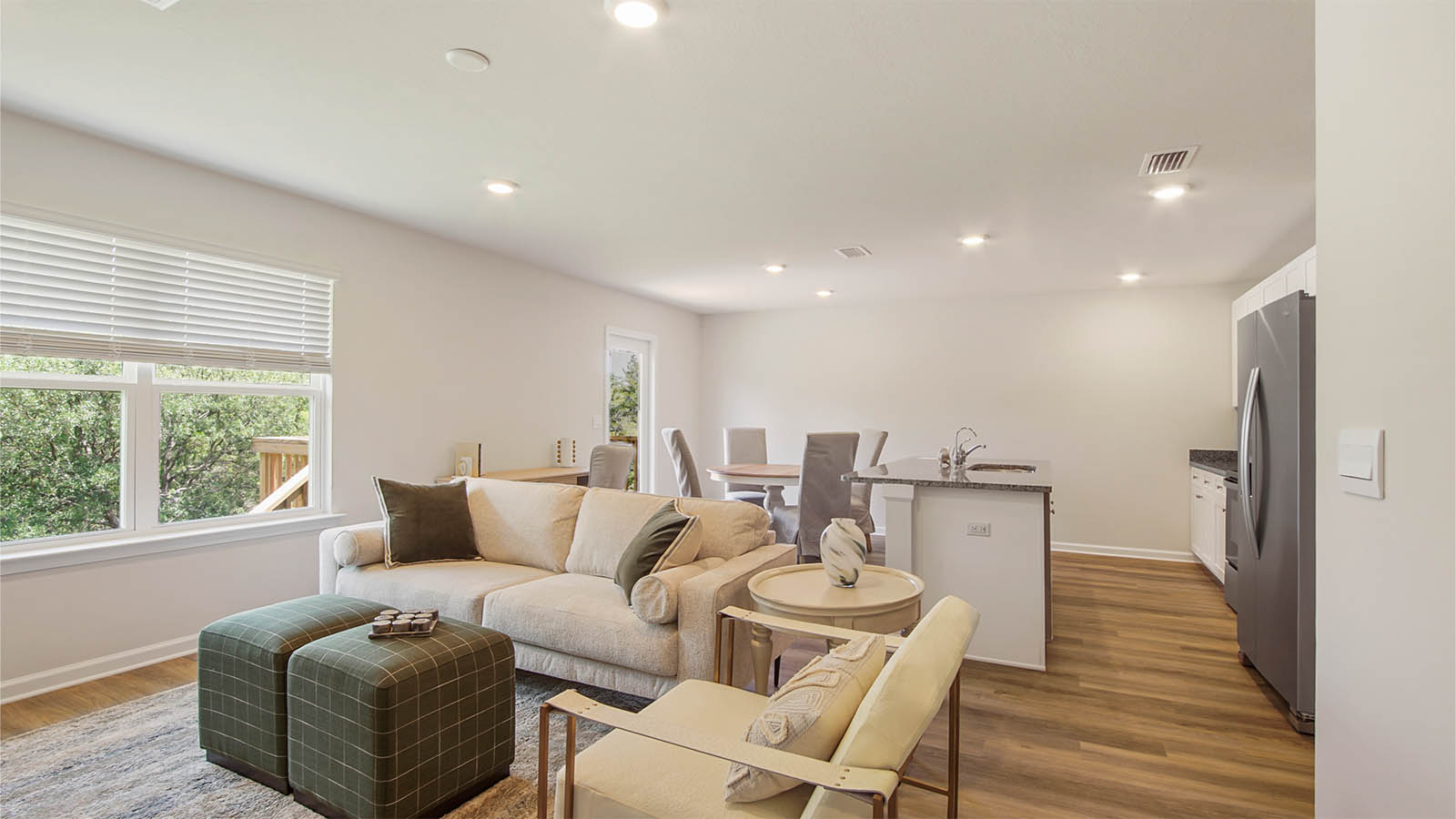 The living area is illuminated by a large window for natural light