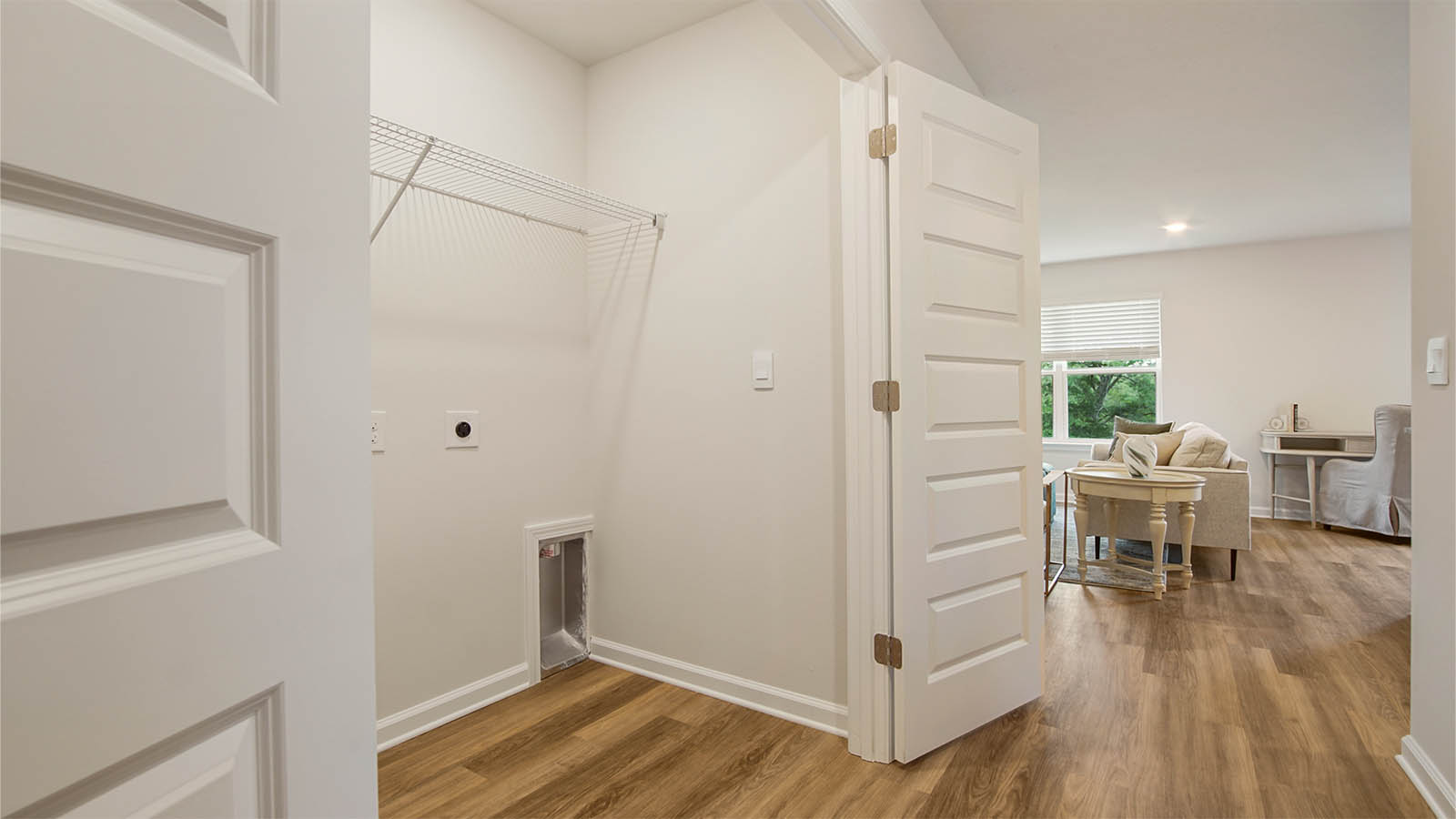 The laundry area has space for a full size washer and dryer