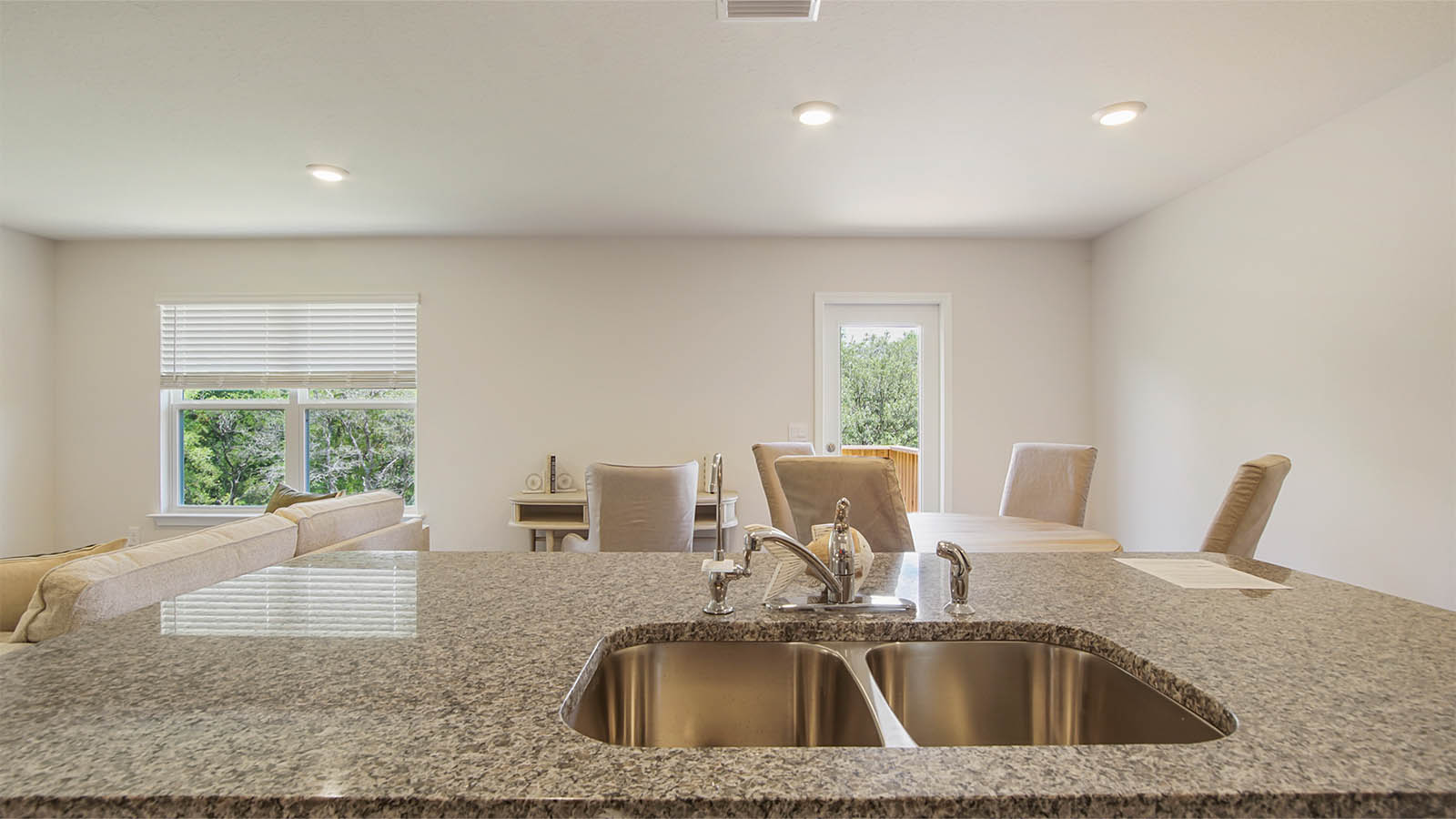 The double basin stainless sink allows for meal preparation and service