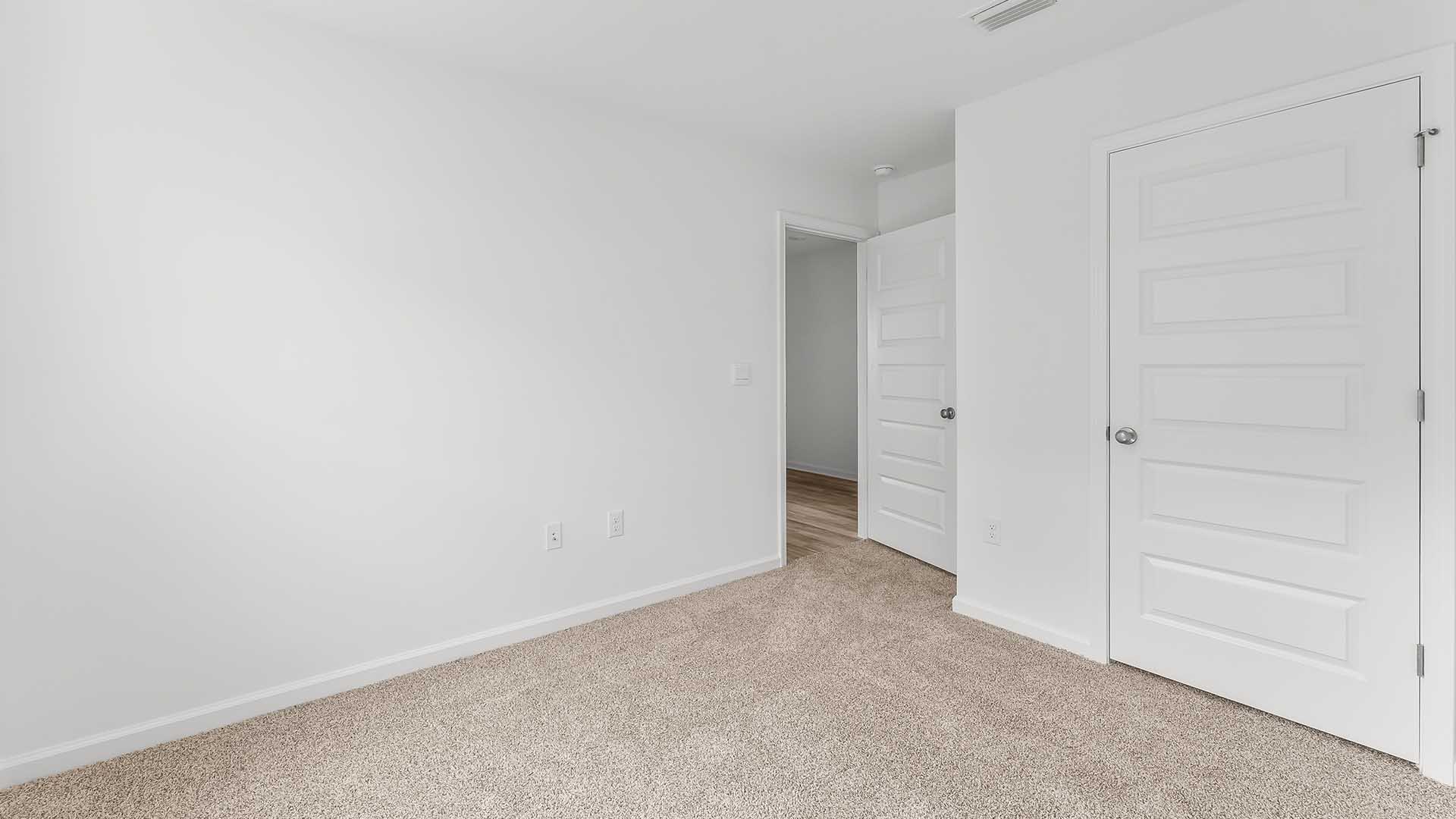 Bedroom two is located at the front of the home