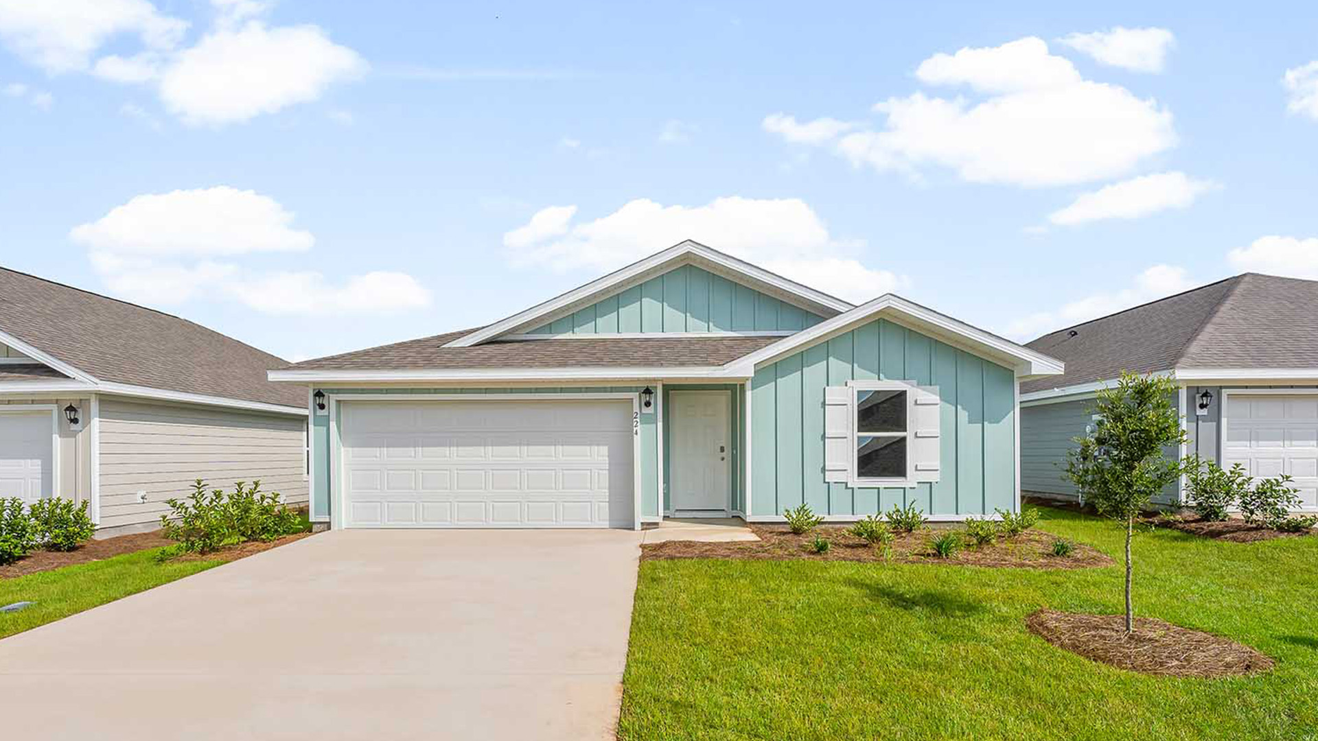 The Freeport has a two car garage and a covered entry