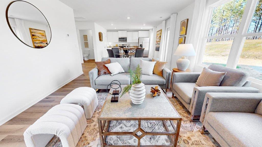 The staged living area can have a pit style seating with plenty of room for family and guests