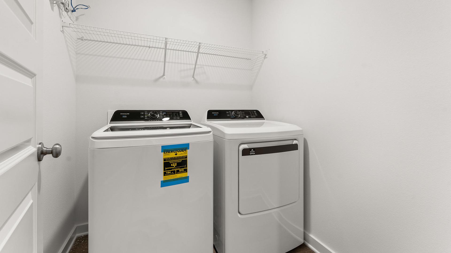There is a laundry area next to the garage access.