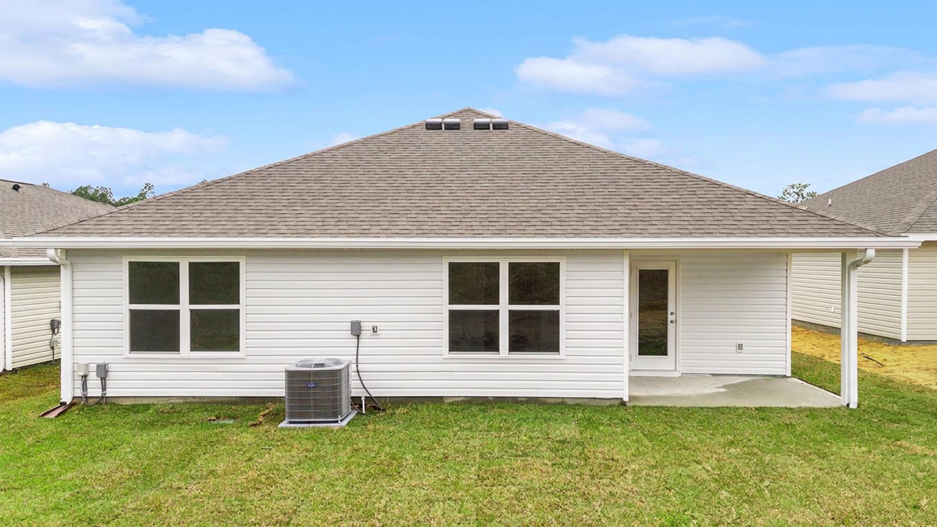 There is a covered back patio with space for outdoor dining or seating area