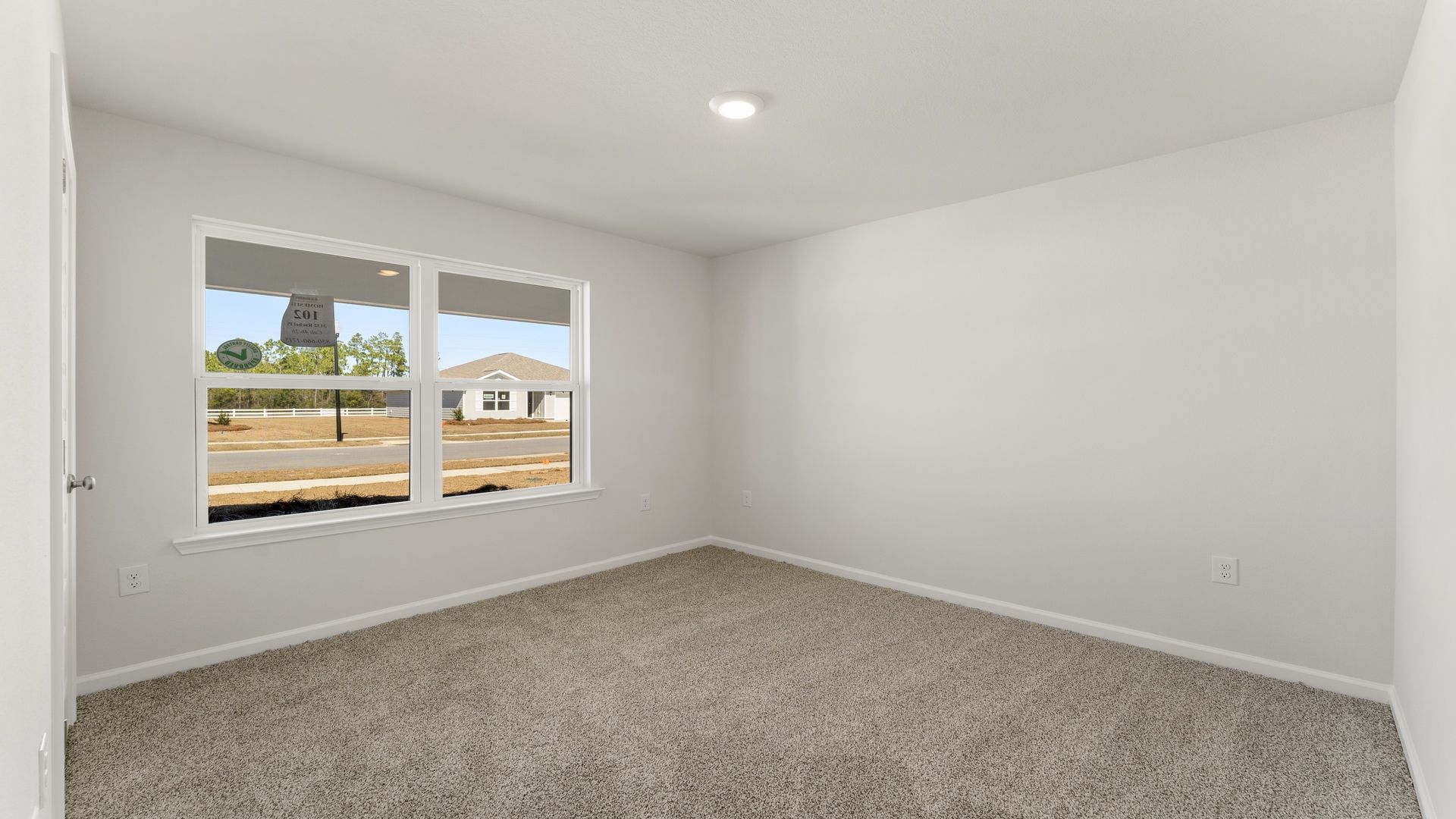 Bedroom two is located at the front of the home