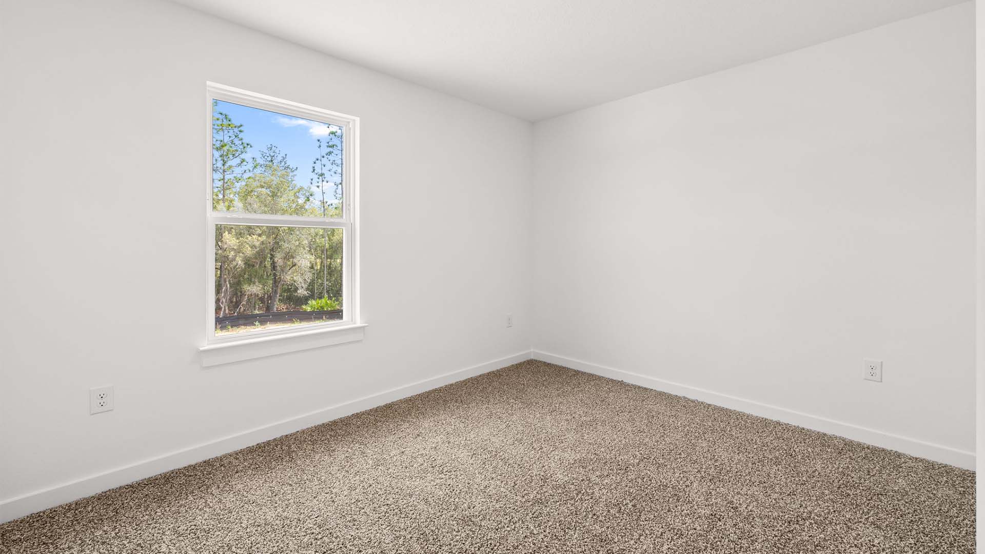 Two of the three guest bedrooms have walk in closets