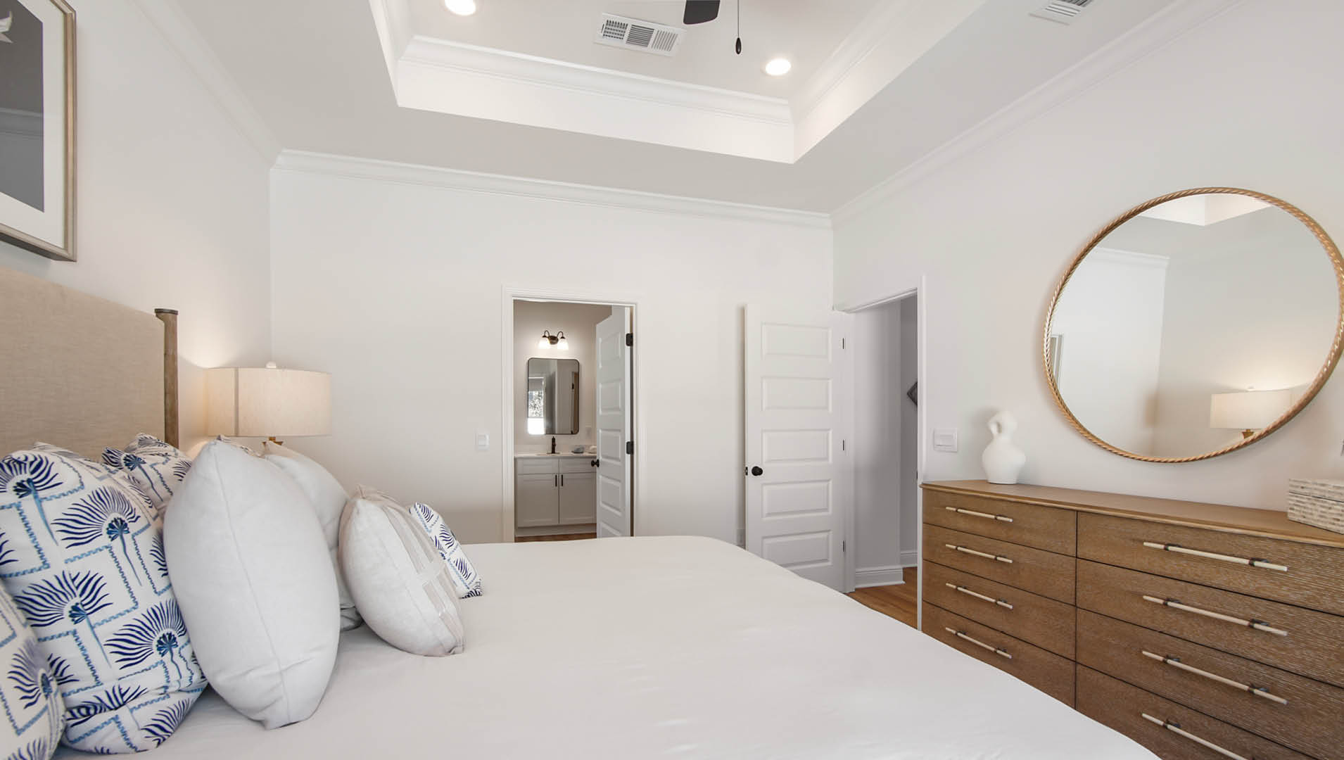 In the primary bedroom you will find EVP flooring and trey ceilings as well as a ceiling fan