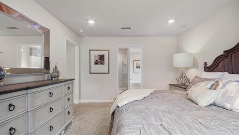 Primary bedroom features private ensuite bath