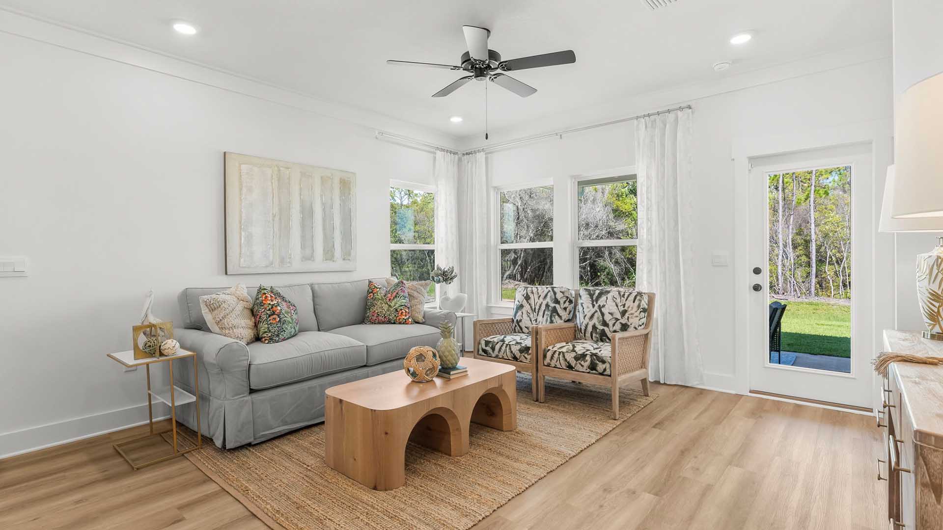 The main level living area is spacious and has access to the covered patio
