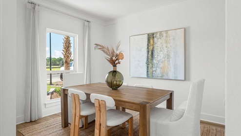 The formal dining room of the Alabaster could also be used as an office. It is at the front of the home and has direct access to the kitchen