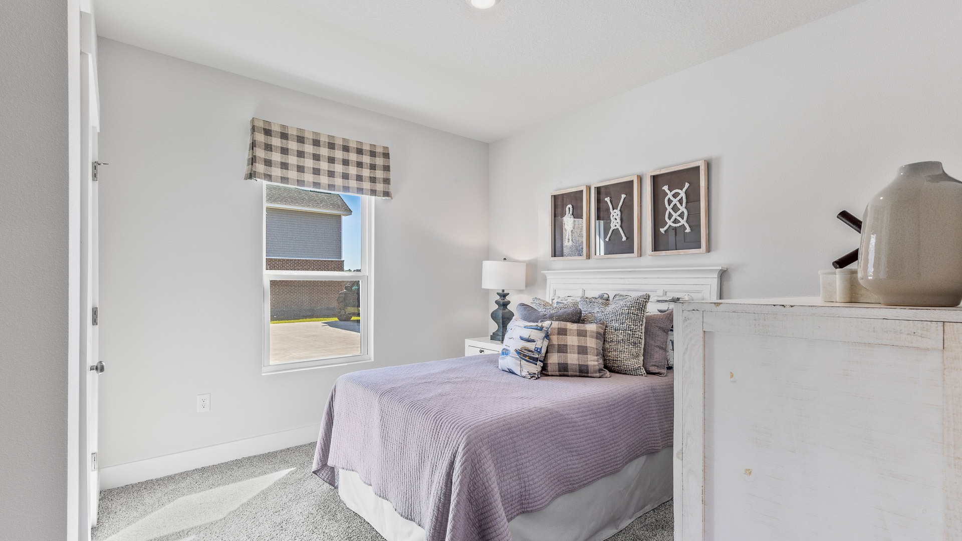 There is a fourth bedroom located off the kitchen area