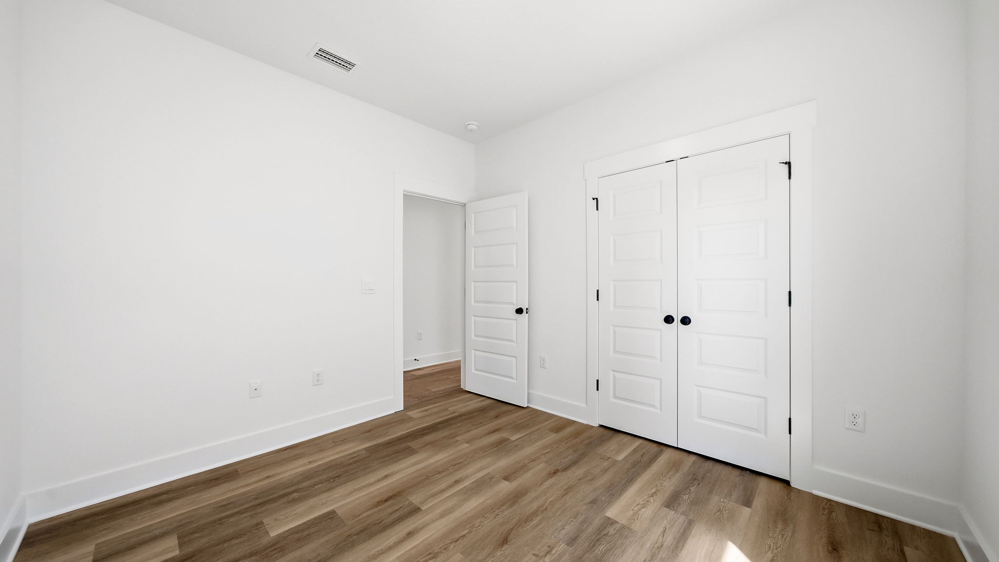 Guest bedroom two has ample closet space