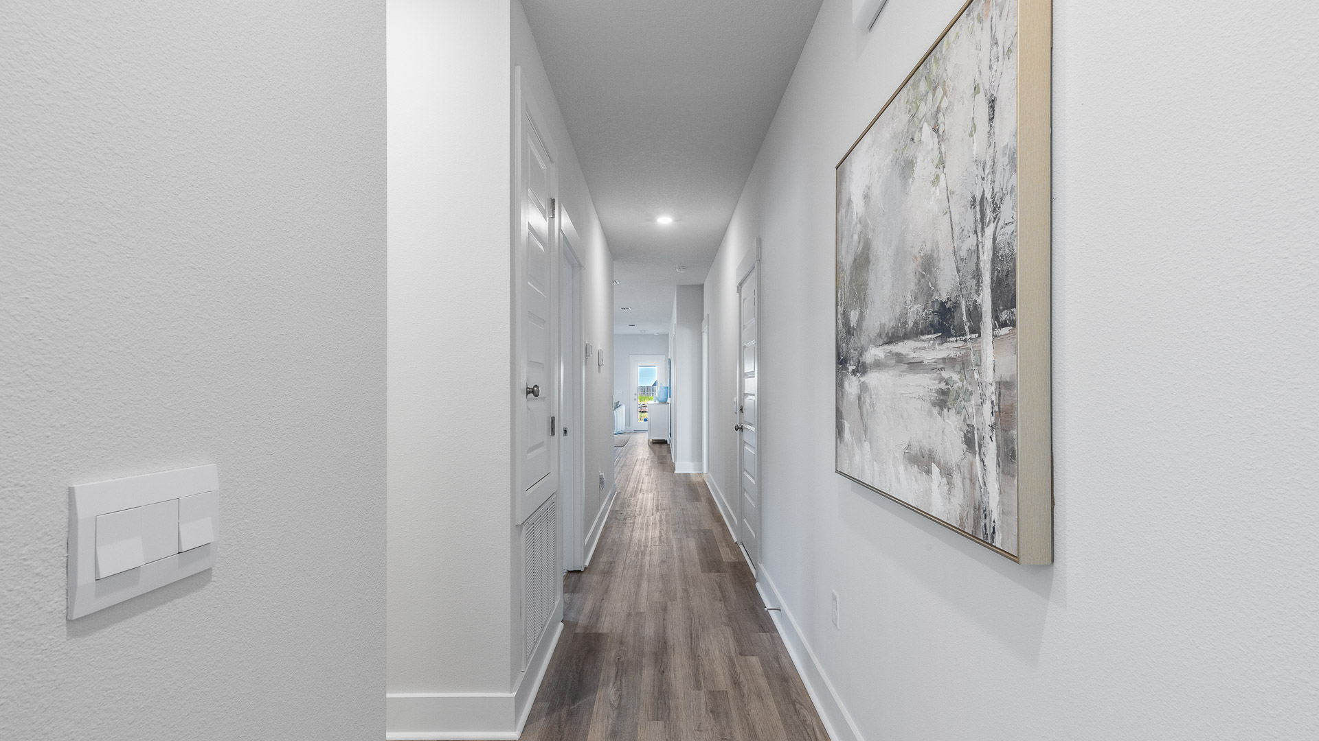 The entry hall leads to a spacious open concept floor plan