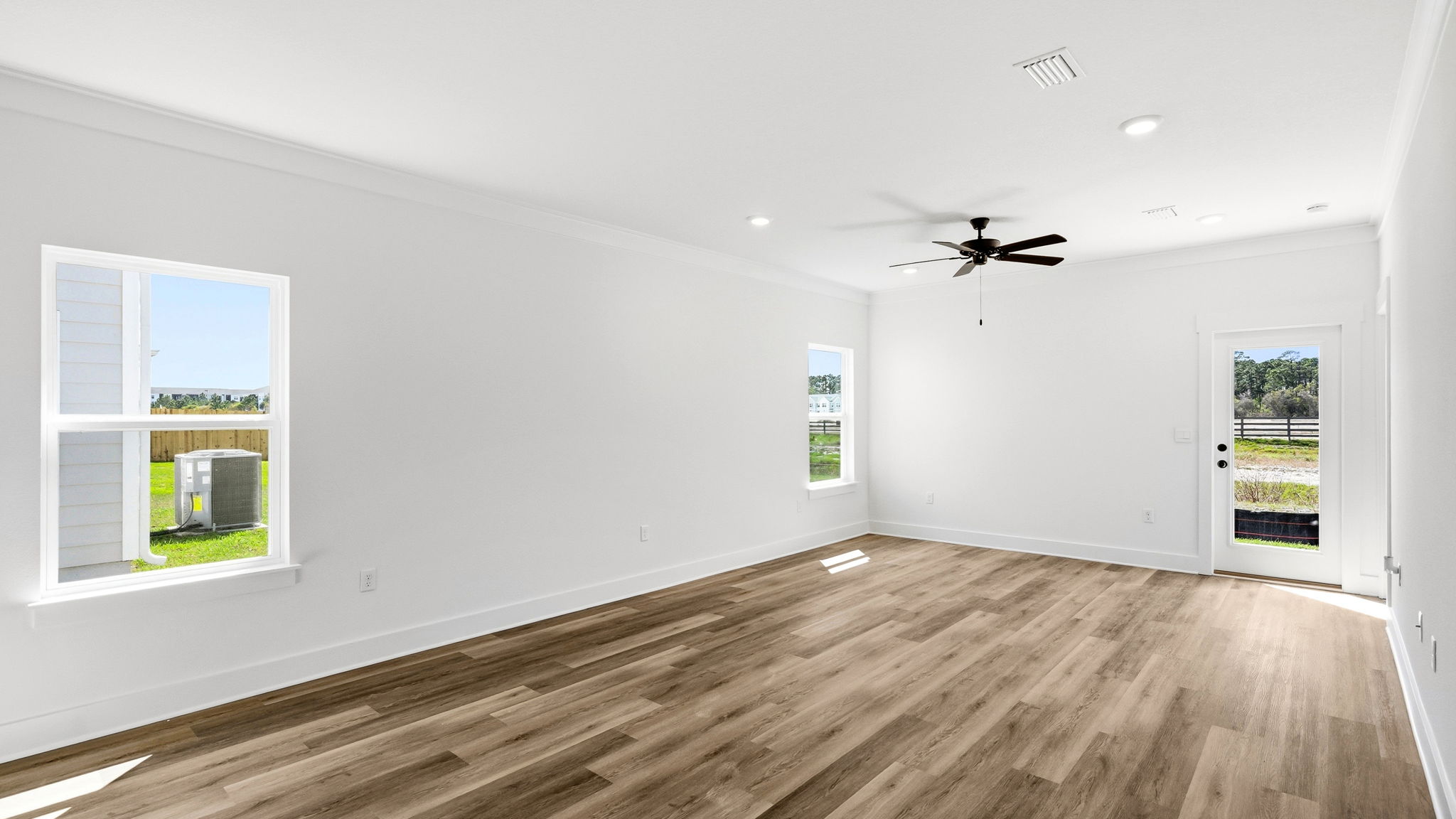 Spacious open living area with EVP flooring