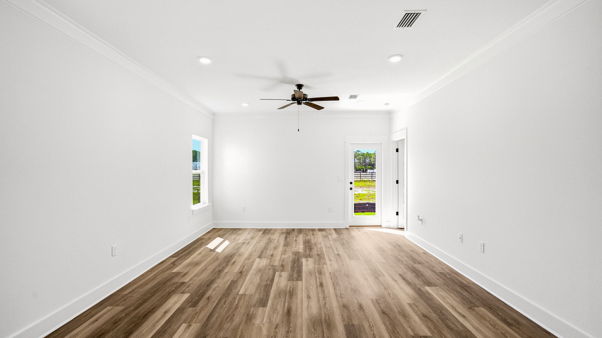 The living area opens to the back patio
