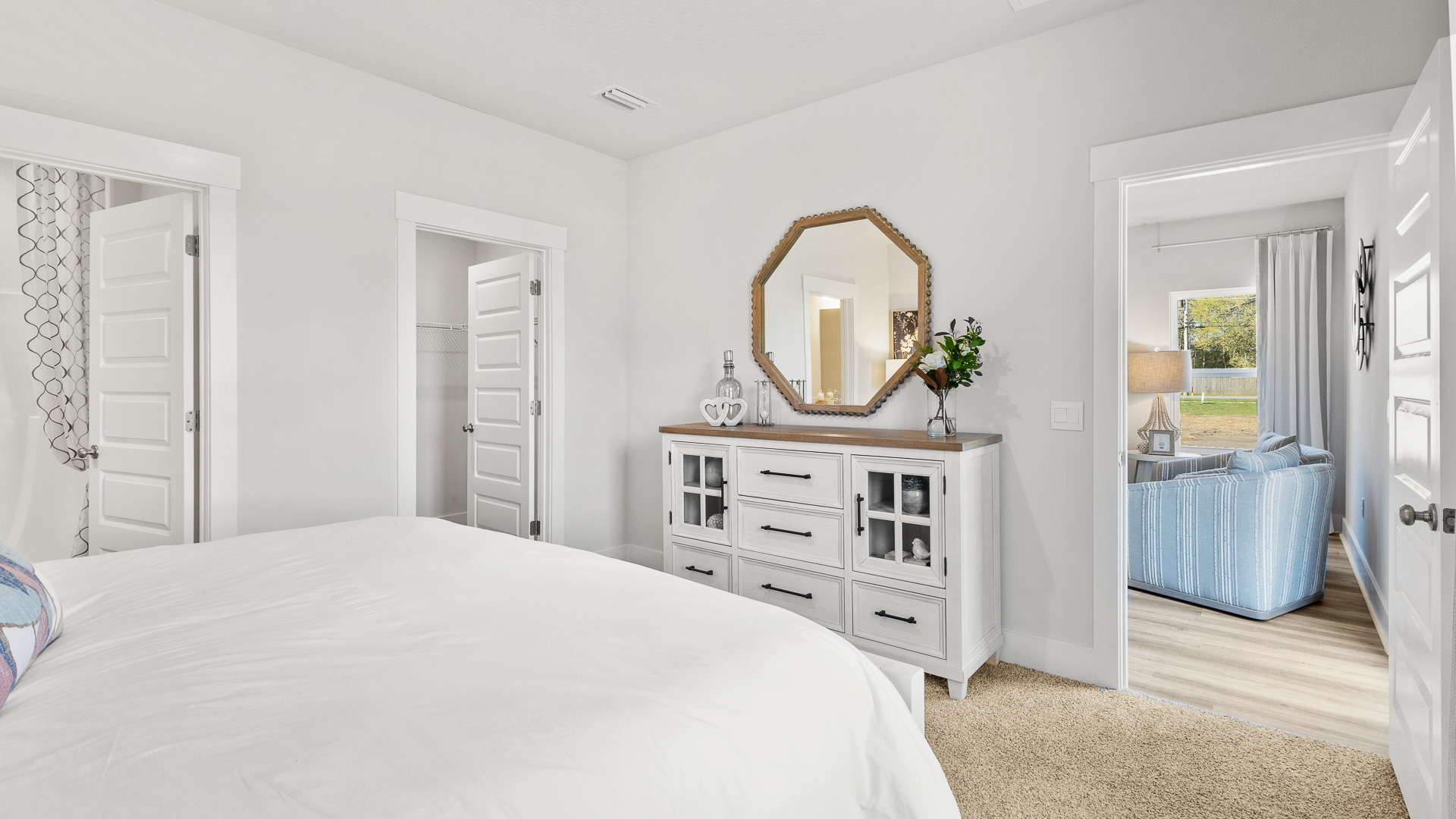 The primary bedroom has a spacious ensuite