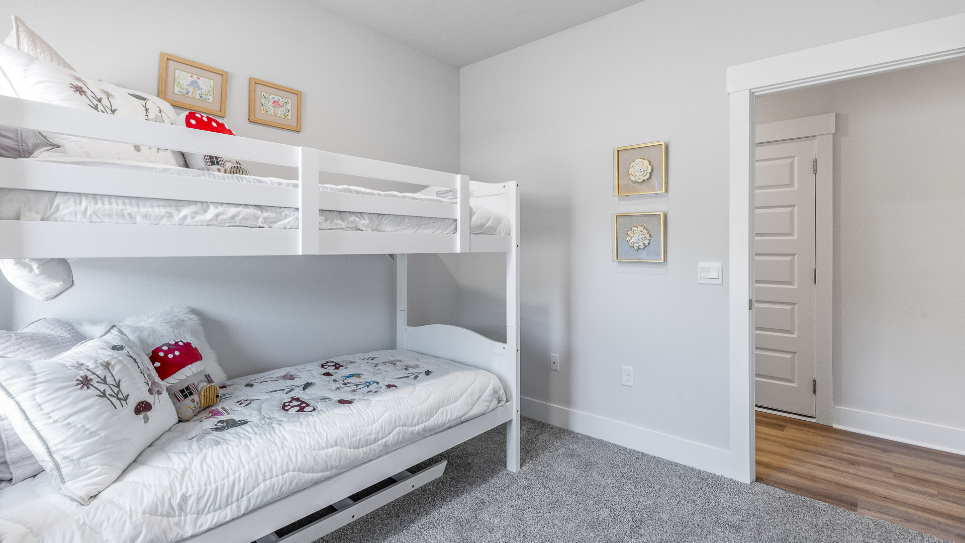 Guest bedroom two is located of the front entry hall