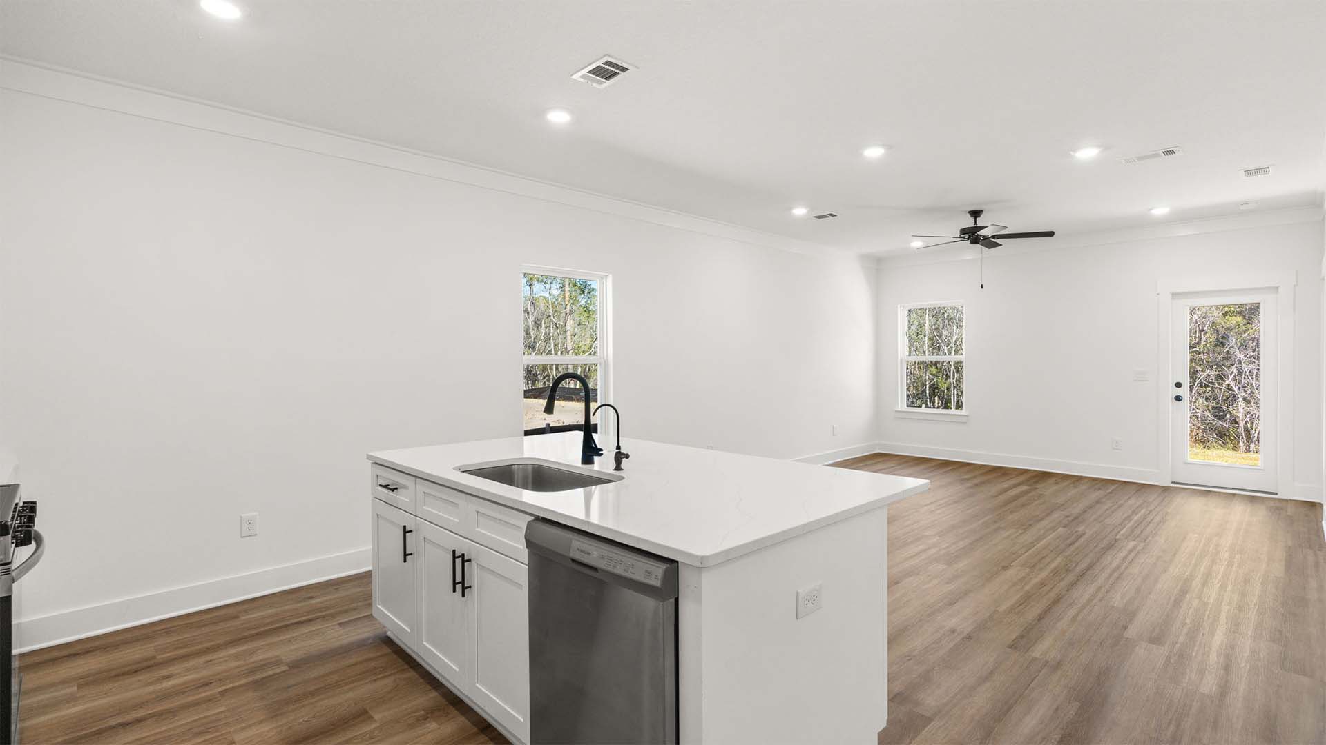 This home has an open concept with kitchen and center island