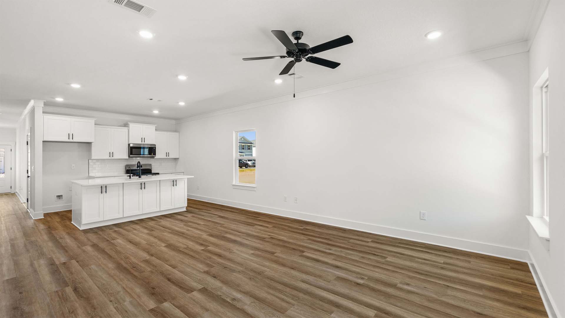 EVP flooring flows throughout the home creating a seamless transition between rooms