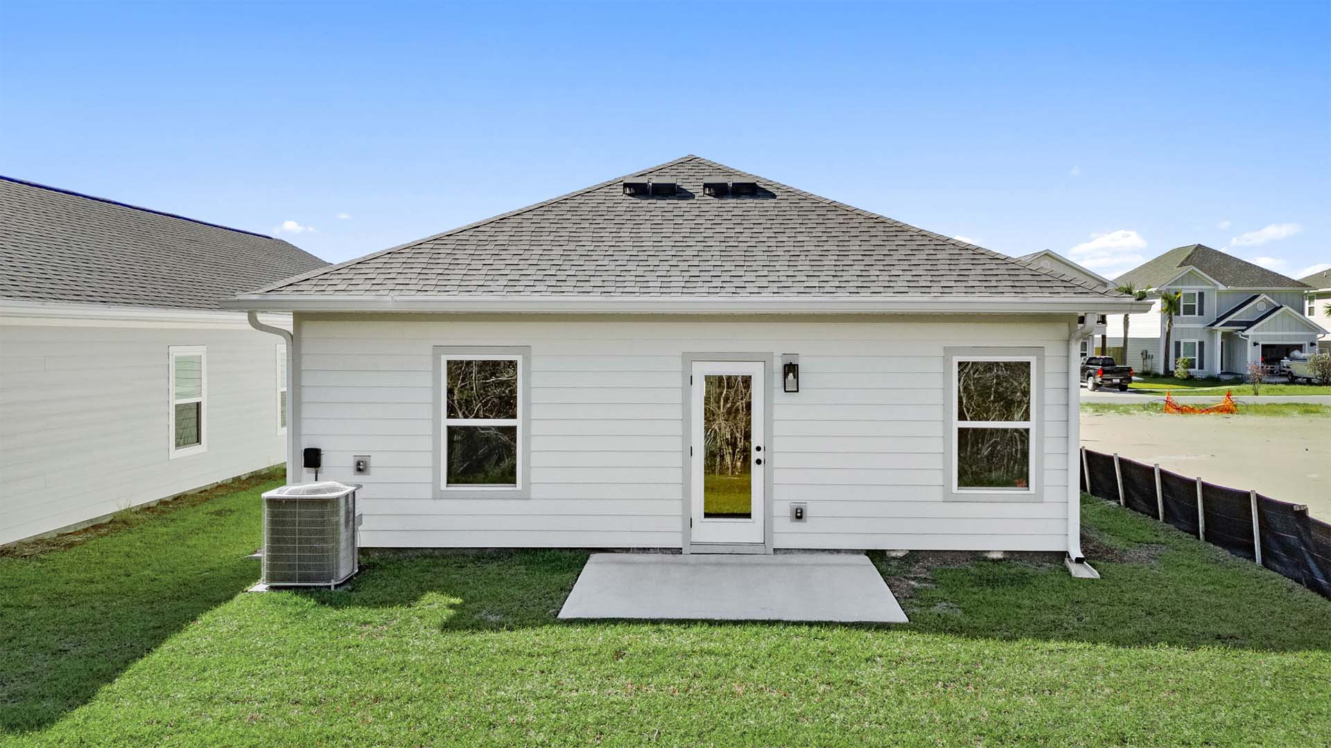 There is an open patio at the back of the home