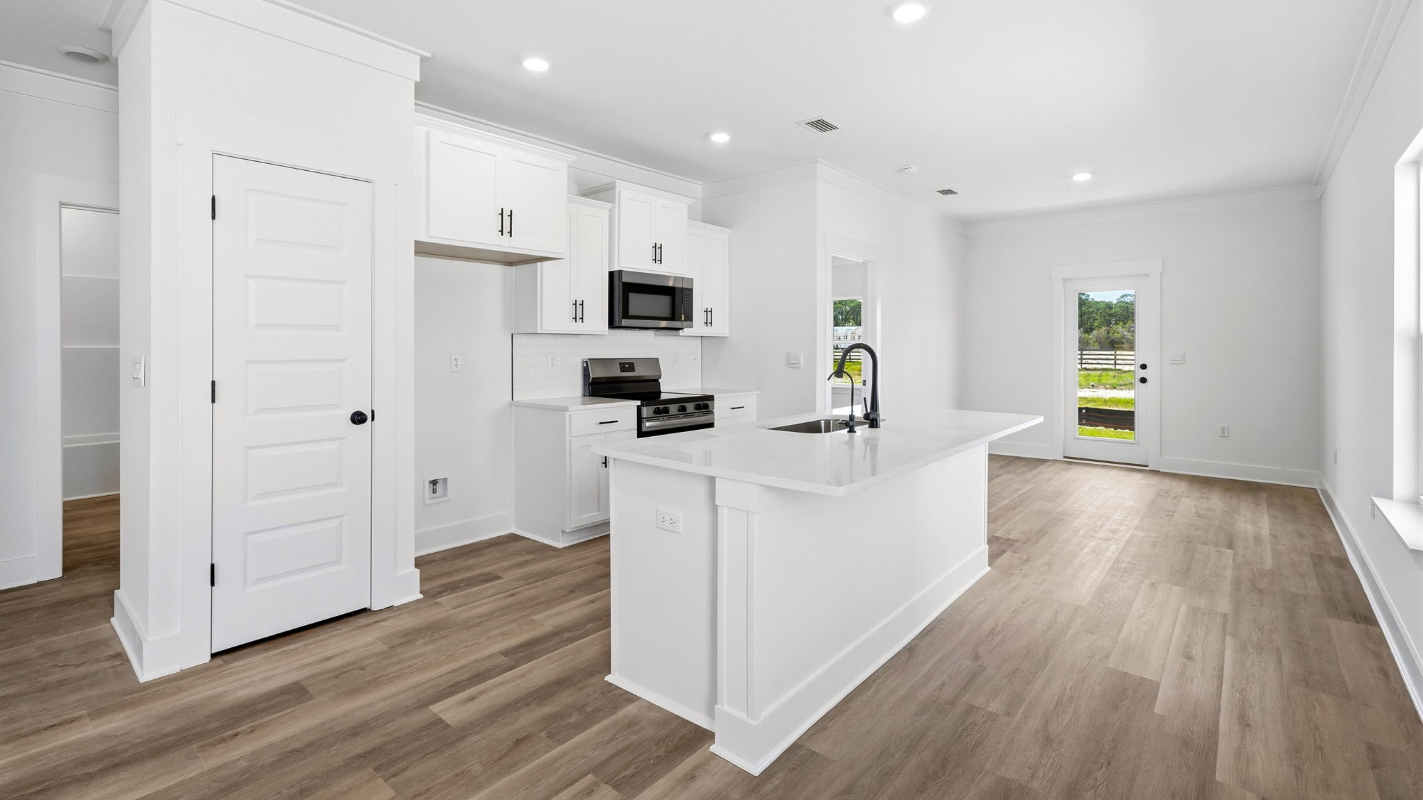 The kitchen is a pantry and cabinetry for storage