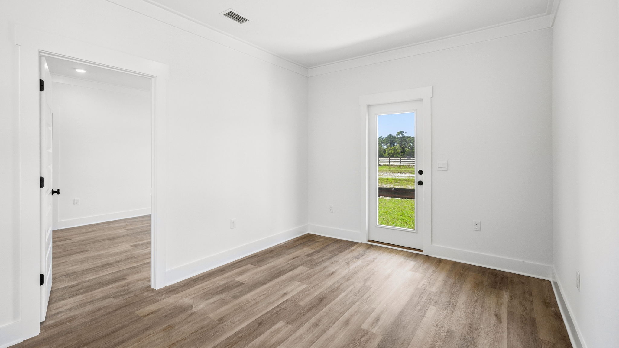 The dining area off the kitchen has access to the patio