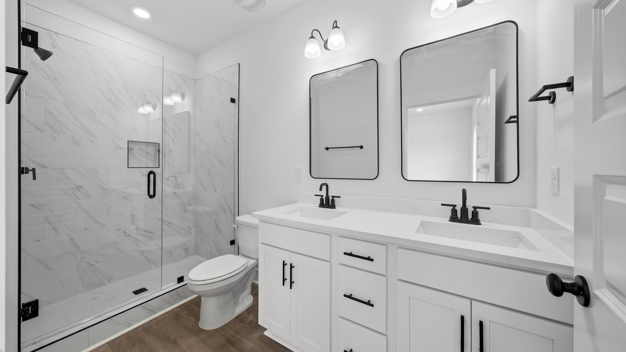 The primary bedroom has an ensuite bath with shower