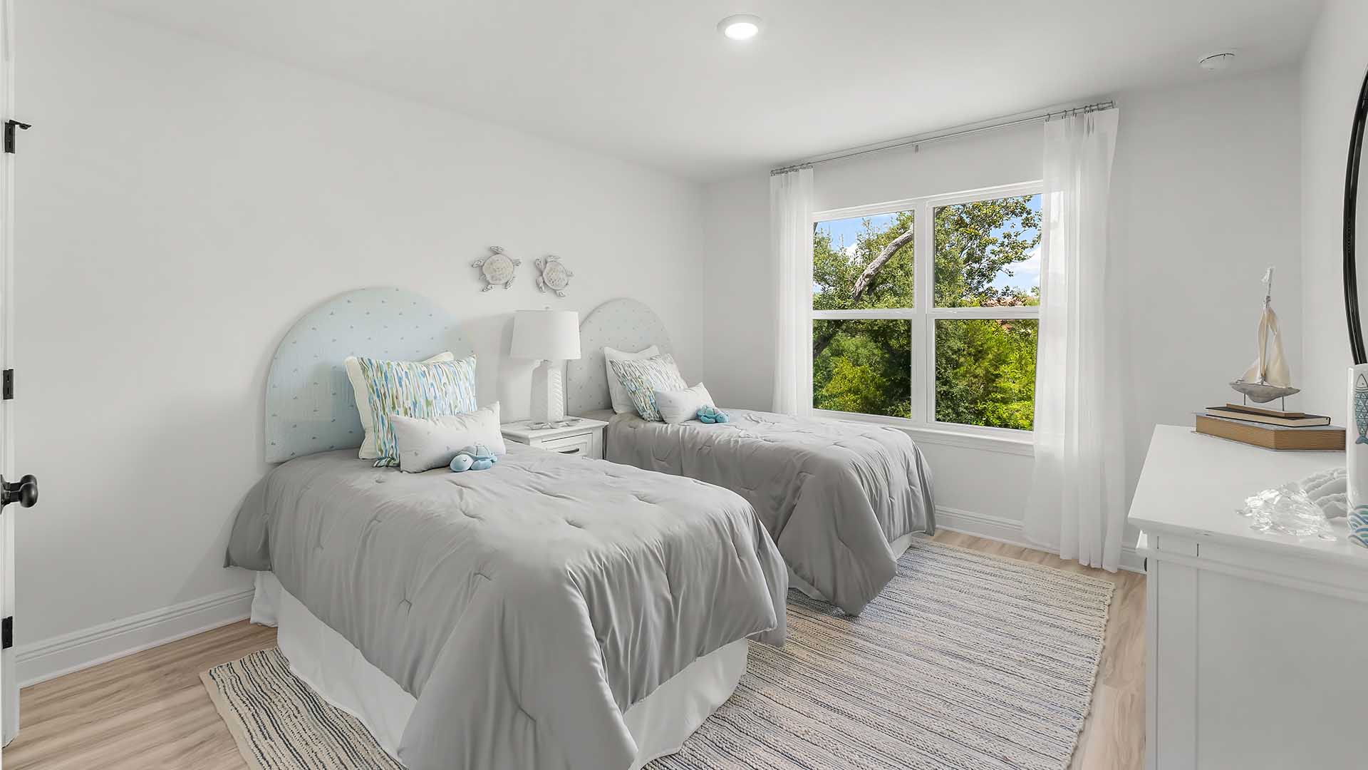 Guest bedroom one has EVP flooring