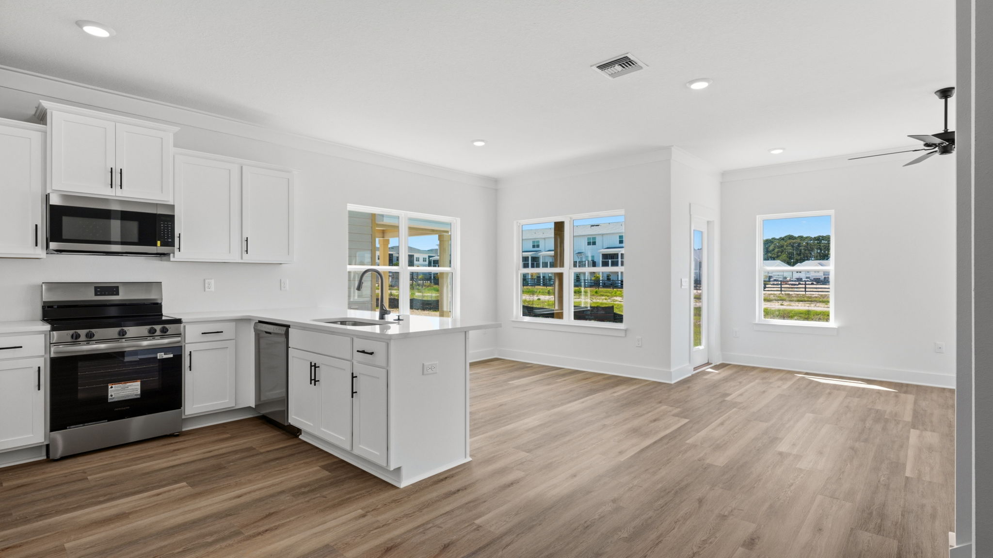 Kitchen overlooks the dining and living areas