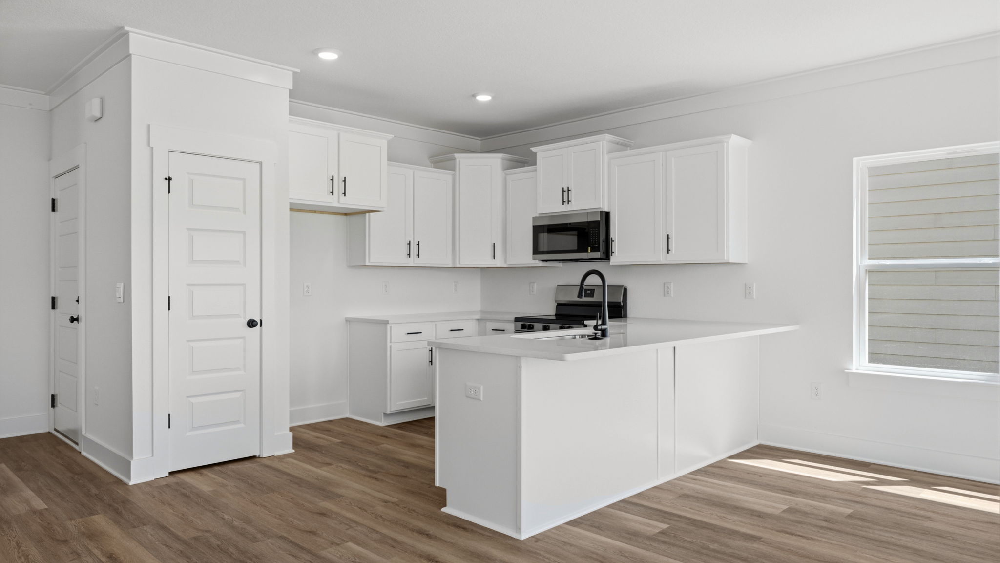 Pantry for storage is located in the kitchen