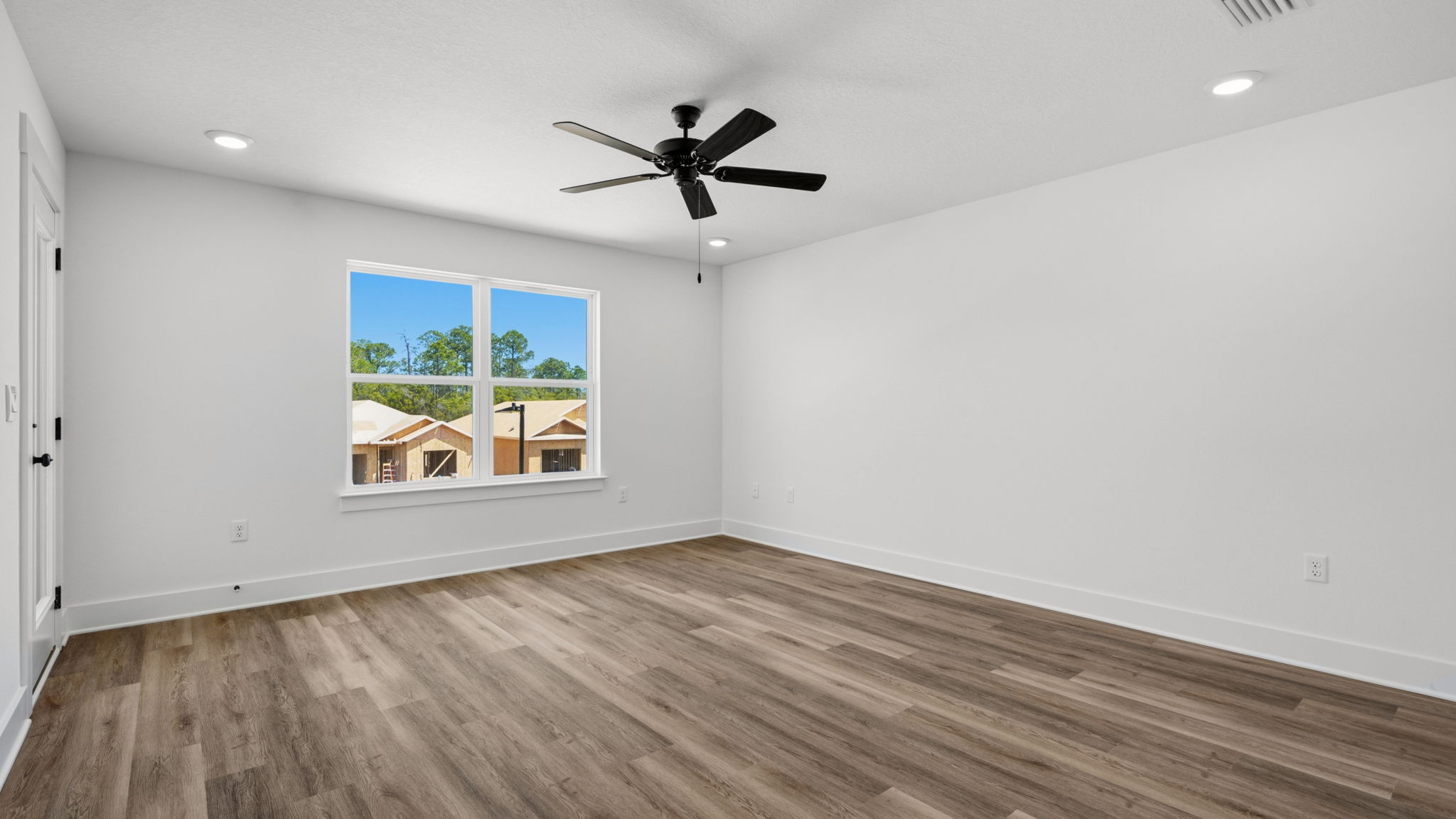 The primary bedroom has space for adding a sitting area