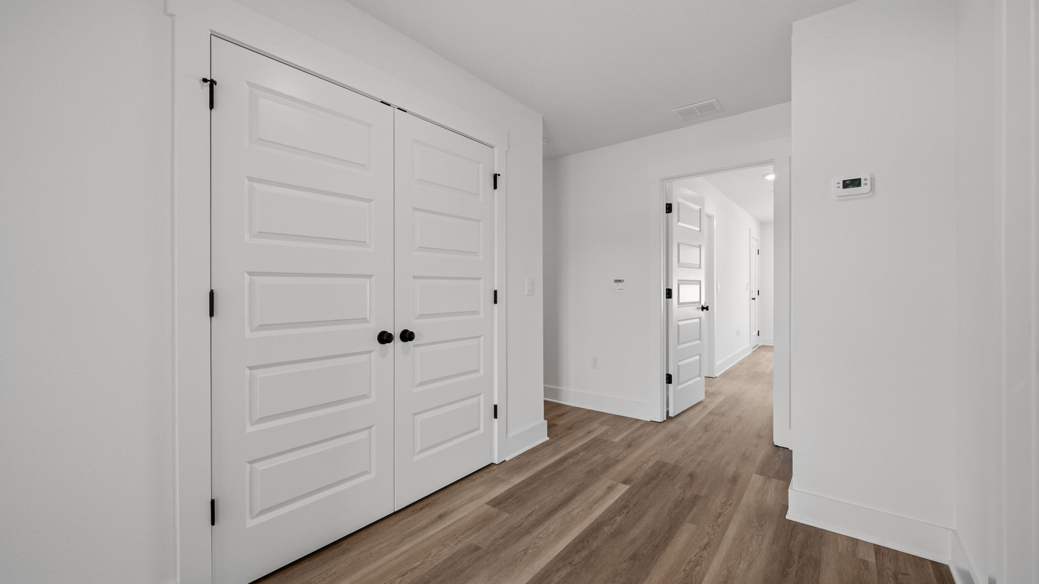 Laundry area located off the guest bedrooms