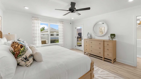 The primary bedroom is located away from the additional bedrooms for privacy