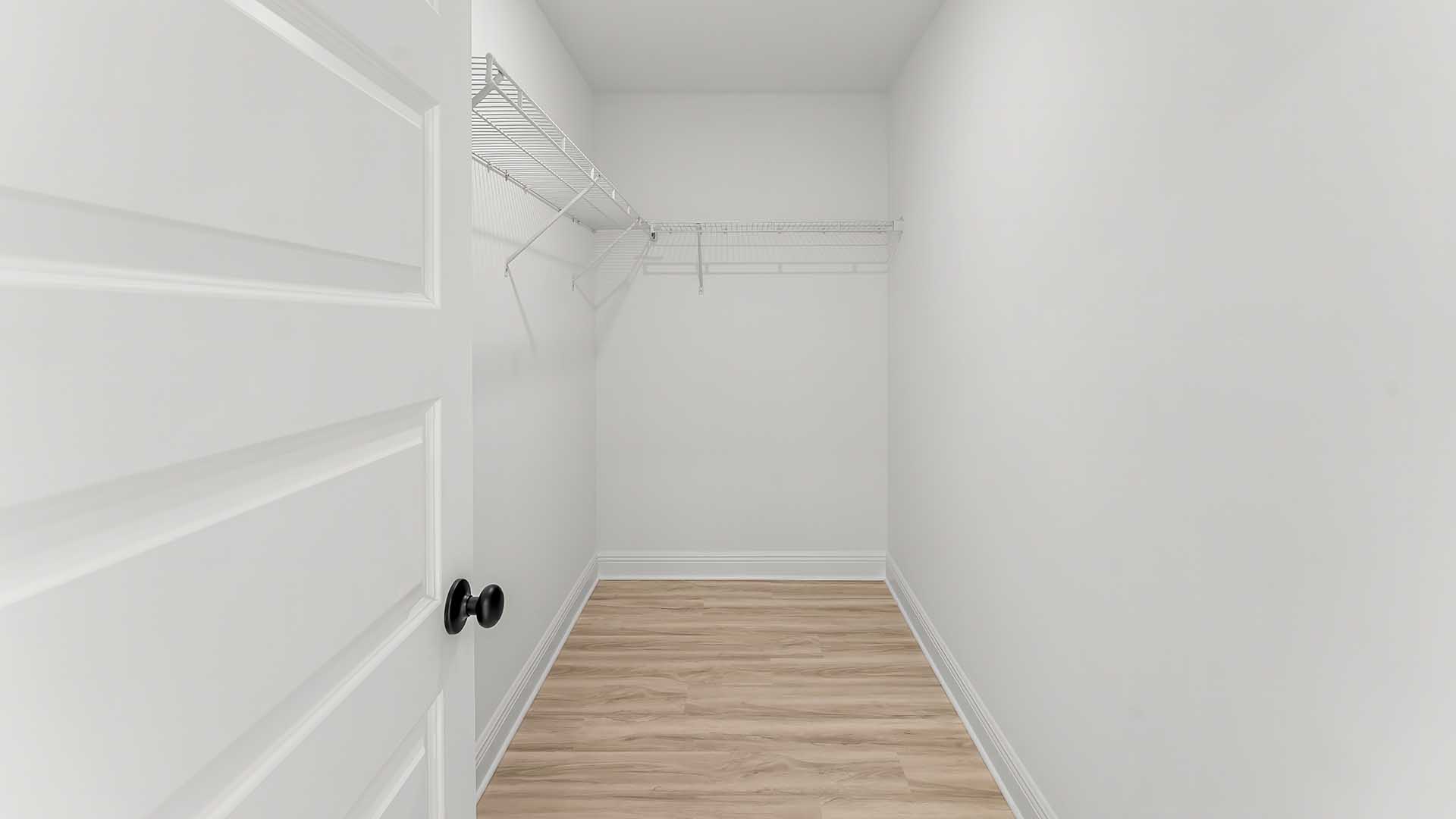 The primary bedroom has a large closet