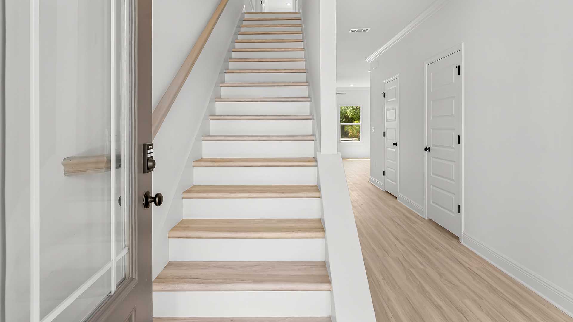 Entry to the Norfolk plan with stairs leading to the second level