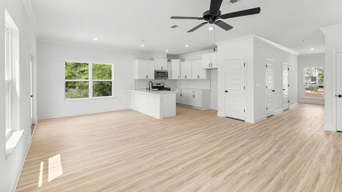 Spacious living area and dining room with open kitchen
