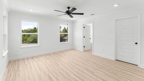 The primary bedroom is spacious and features a closet