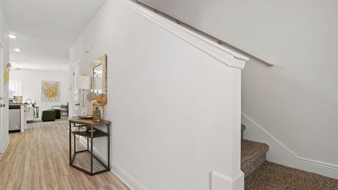 Entry hall leading to open living area