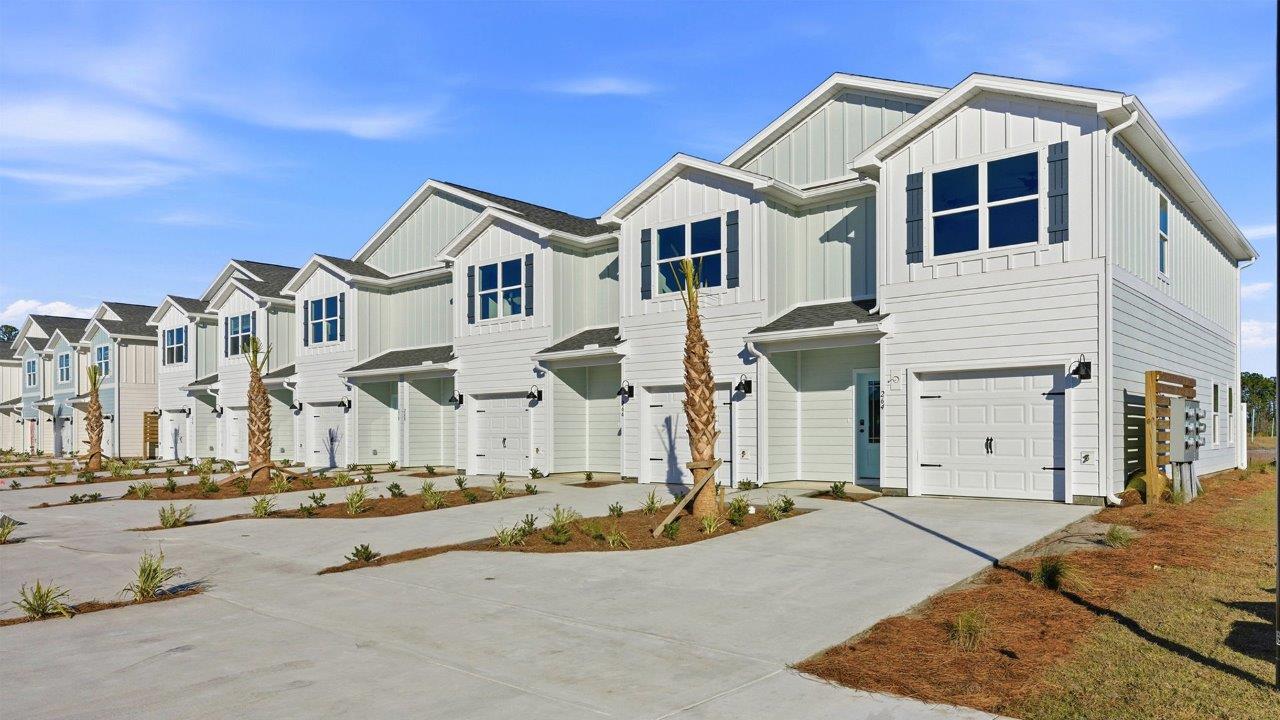 249 Phillips Bluff Avenue is under construction. This is an end unit townhome with three bedrooms and two and a half bathrooms with a single car garage